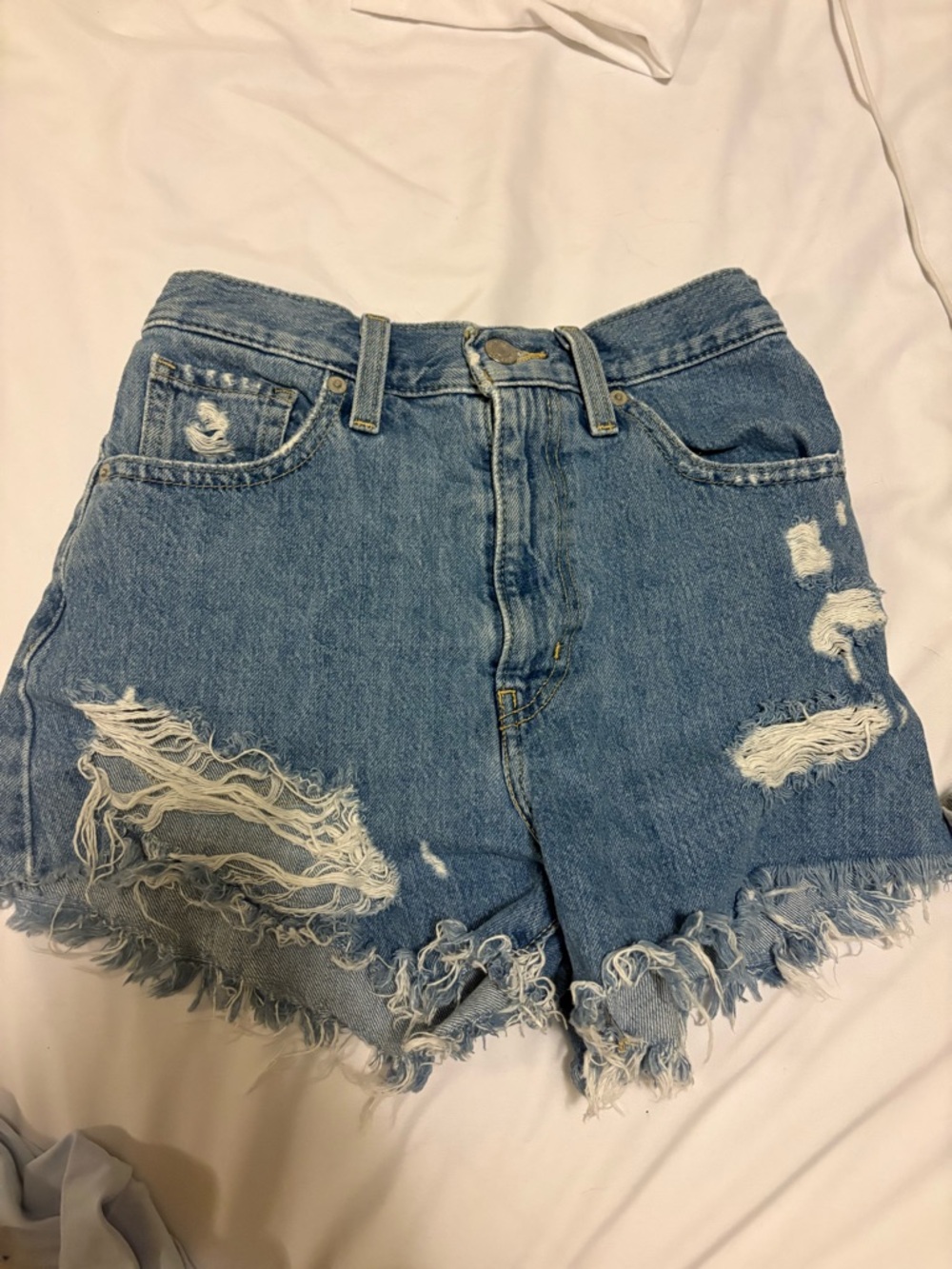 Levi's Distressed Light Blue High-Waist Jean Shorts